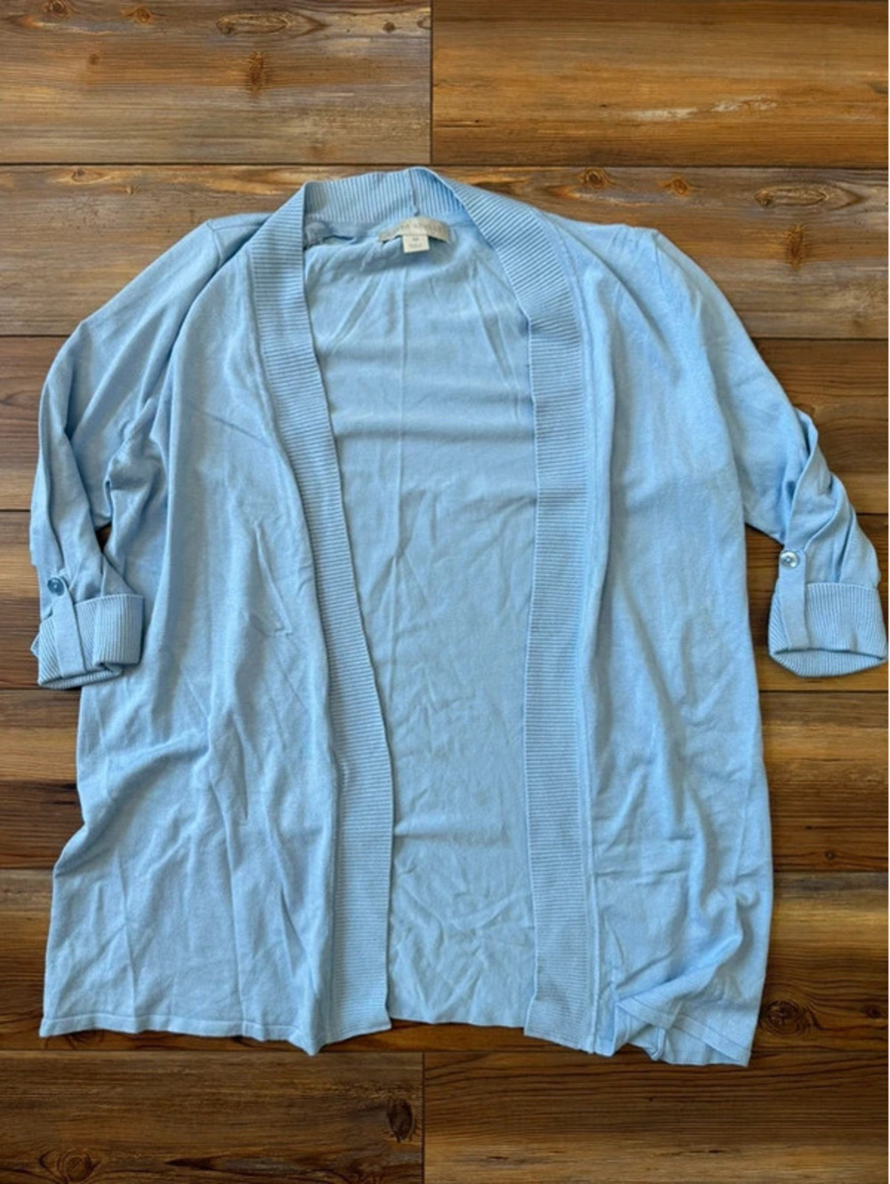 Laura Ashley’s blue cardigan size medium
